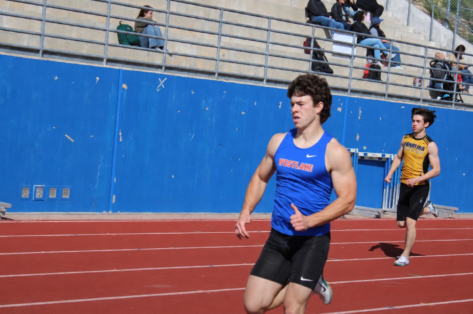 Dash Wolcott sprinting for Westlake track